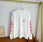 White long-sleeve T-shirt with small chest logo and red sleeve accents