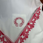 White long-sleeve T-shirt with red sleeve graphic and chest patch logo
