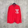 Red long-sleeve knit cardigan with button front and white monogram LV graphic