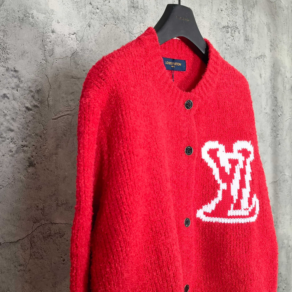 Red knit cardigan with button front and white LV monogram on chest