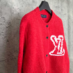 Red knit cardigan with button front and white LV monogram on chest