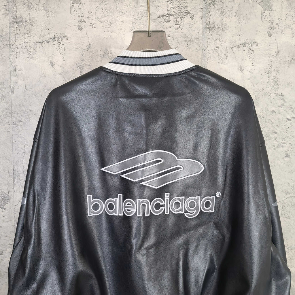 Balenciaga leather bomber jacket back view with large balenciaga logo and rib collar