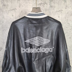 Balenciaga leather bomber jacket back view with large balenciaga logo and rib collar