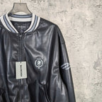 Balenciaga leather bomber jacket front view with zipper and crest patch
