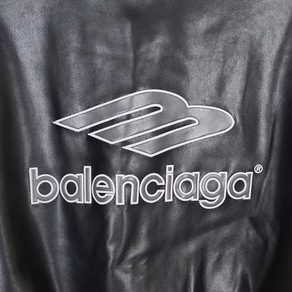 Balenciaga black long-sleeve jacket with front logo graphic