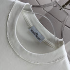 White T-shirt neckline with Stone Island label inside collar