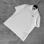 Balenciaga white polo shirt with collar and short sleeves, chest logo embroidery visible