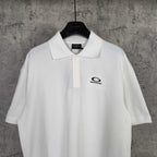 Balenciaga white polo shirt with collar, button placket, and chest logo detail