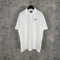 Balenciaga white polo shirt with button placket and embroidered logo on chest