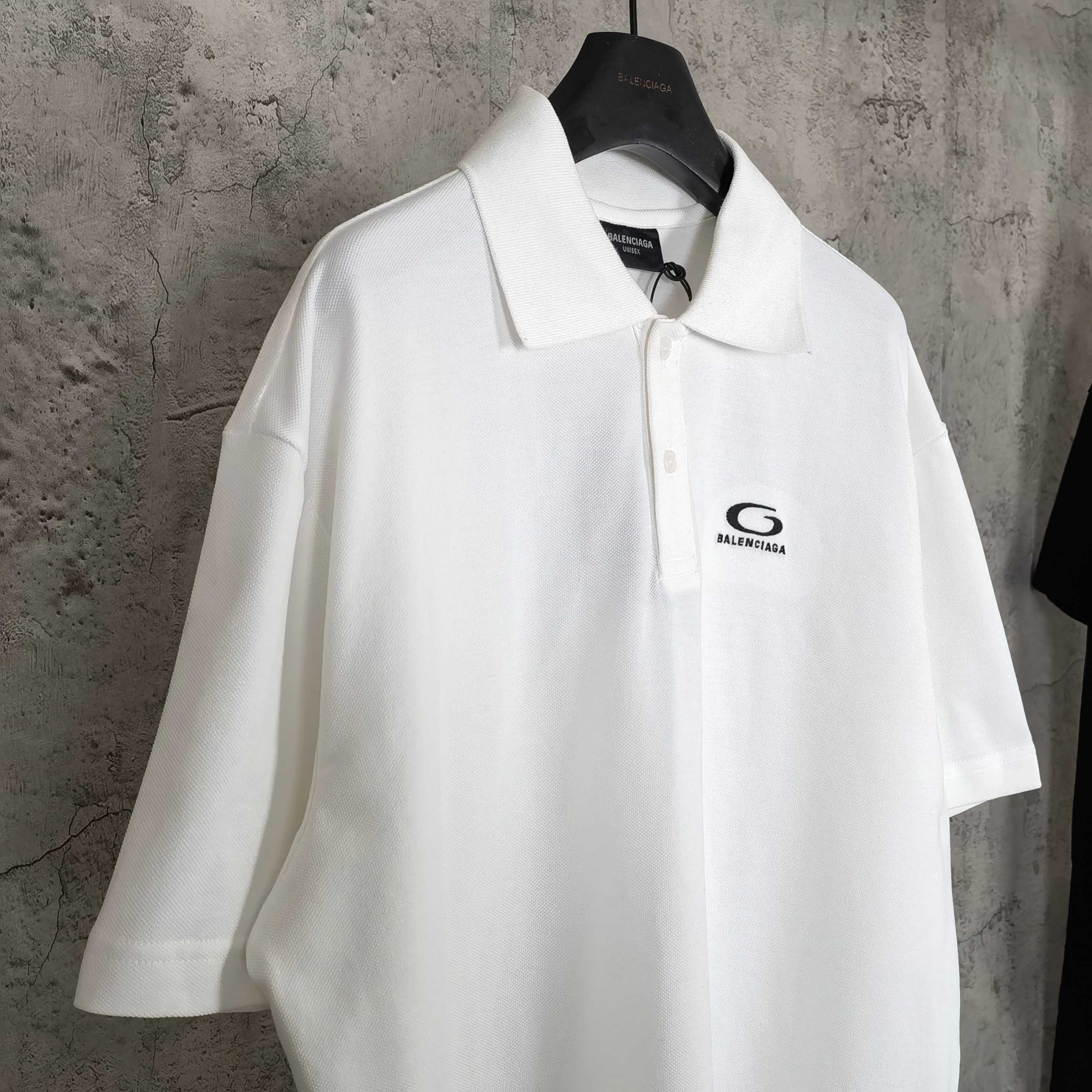 Balenciaga white polo shirt with collar and button placket, chest logo on left