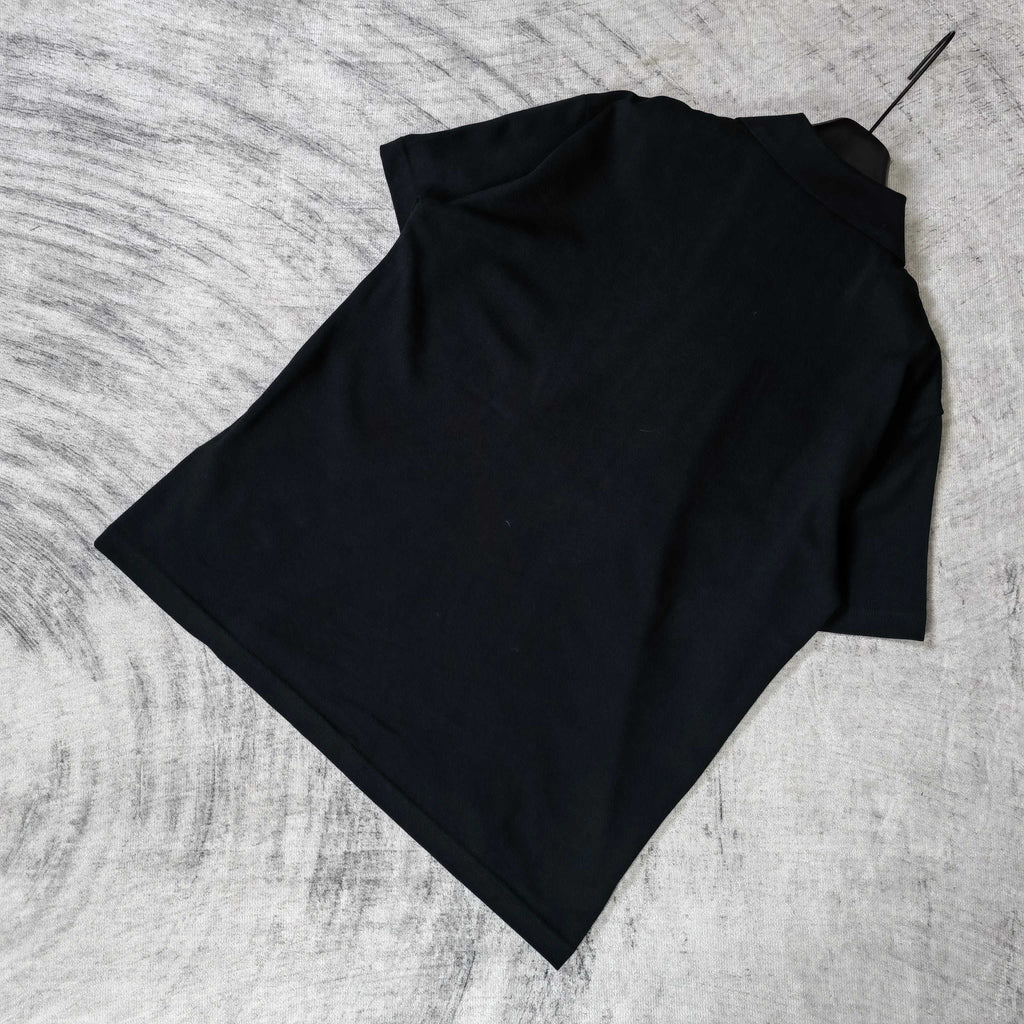Balenciaga polo shirt, dark color, back view from folded position
