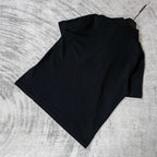 Balenciaga polo shirt, dark color, back view from folded position