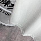 Amiri white T-shirt hem and side seam close-up with clean stitched finish