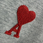 Heather gray knit with red heart-shaped logo patch detail.
