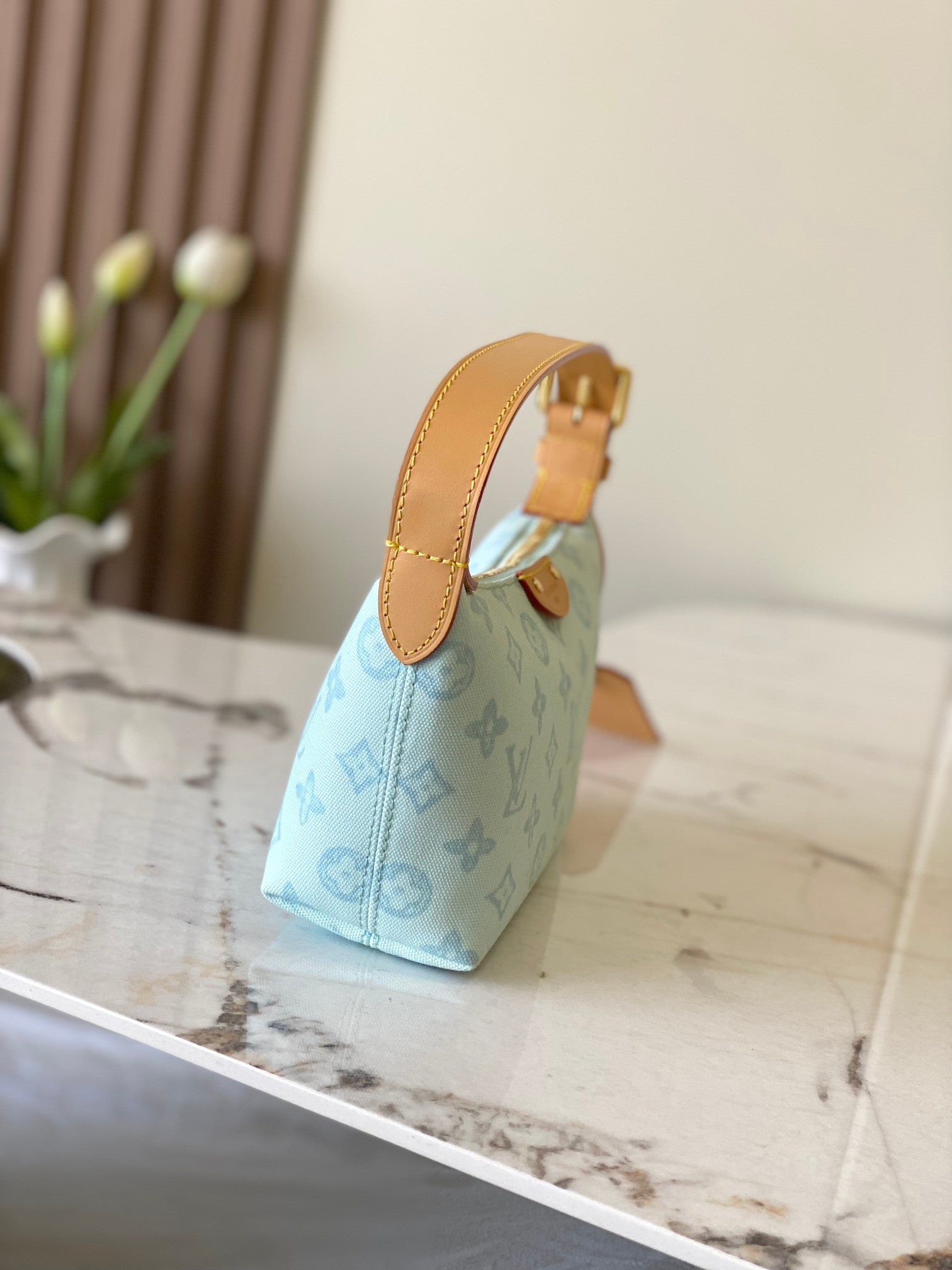Louis Vuitton light blue monogram mini handbag with tan top handle and side strap