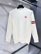 Versace knit sweater in white with red chest logo and orange striped sleeve detail
