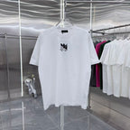 Amiri white T-shirt with small black logo graphic on chest