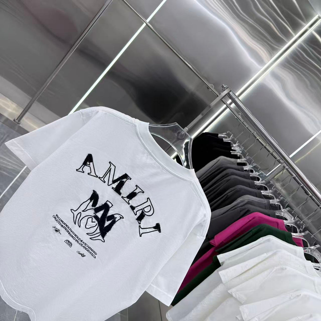 Amiri white T-shirt back with AMIRI lettering and logo graphic