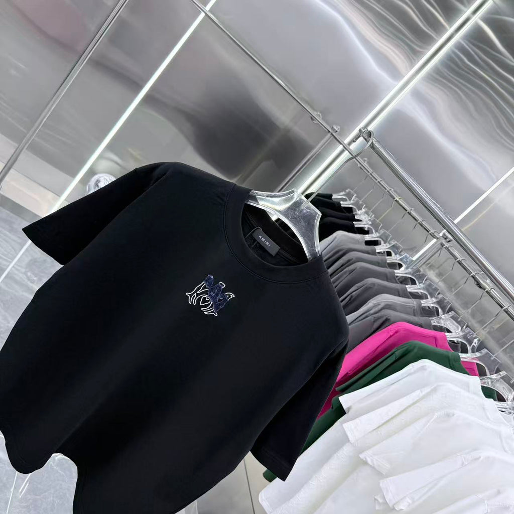 Black crew-neck T-shirt detail with blue-and-white chest logo