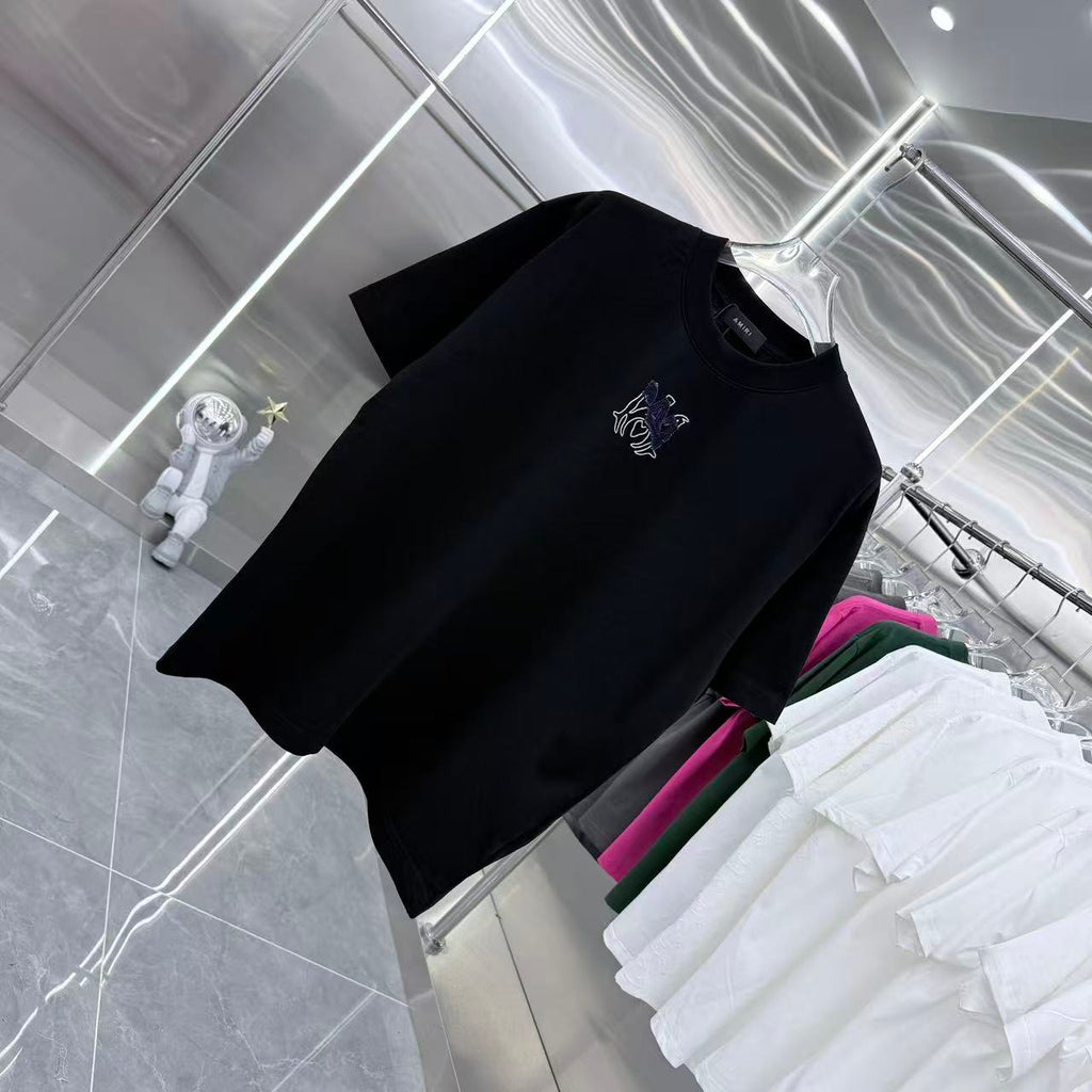 Black crew-neck T-shirt on hanger with blue-and-white chest graphic