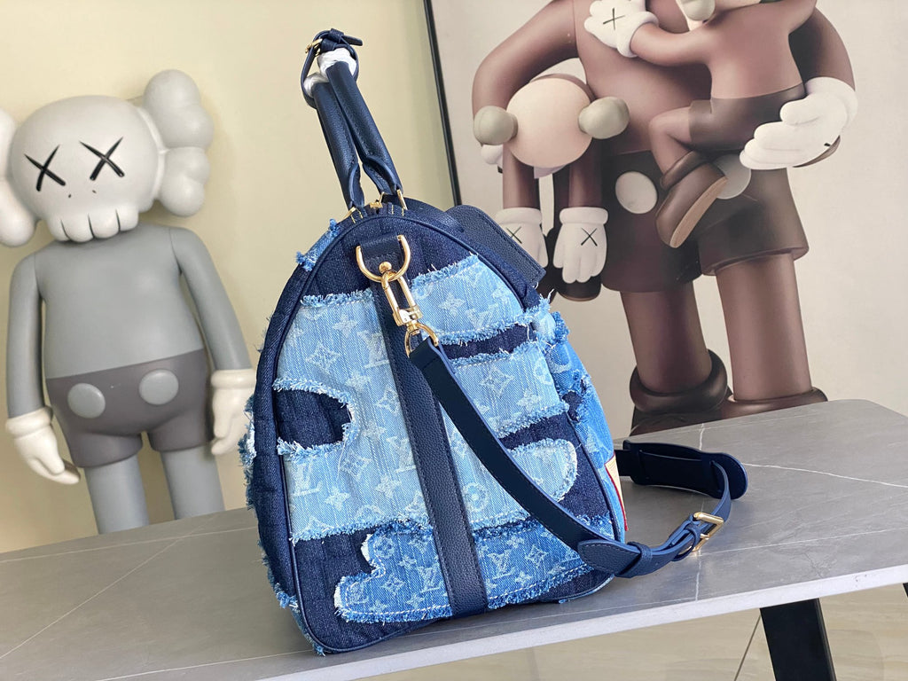 Blue patchwork denim crossbody bag with top handle and adjustable strap, gold hardware