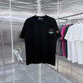 Black short-sleeve T-shirt with Moncler crest patches on chest