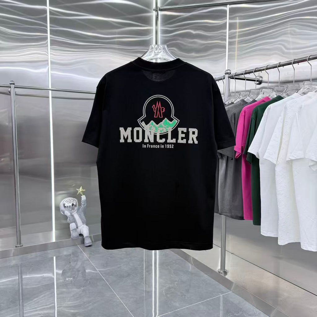 Black short-sleeve Moncler logo T-shirt with crest graphic on front