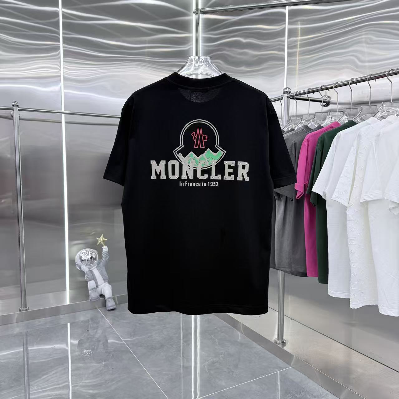Black short-sleeve Moncler logo T-shirt with crest graphic on front