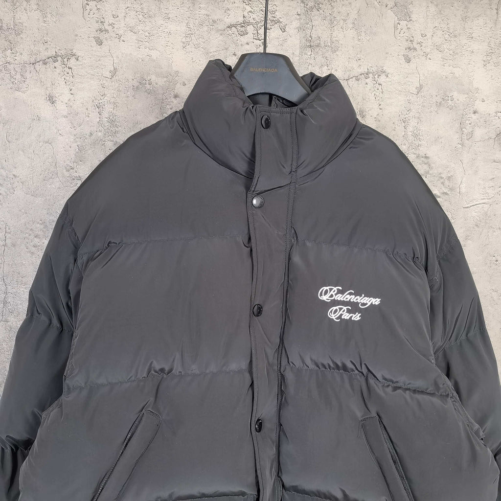 Long hooded puffer jacket in dark gray with chest logo and front buttons