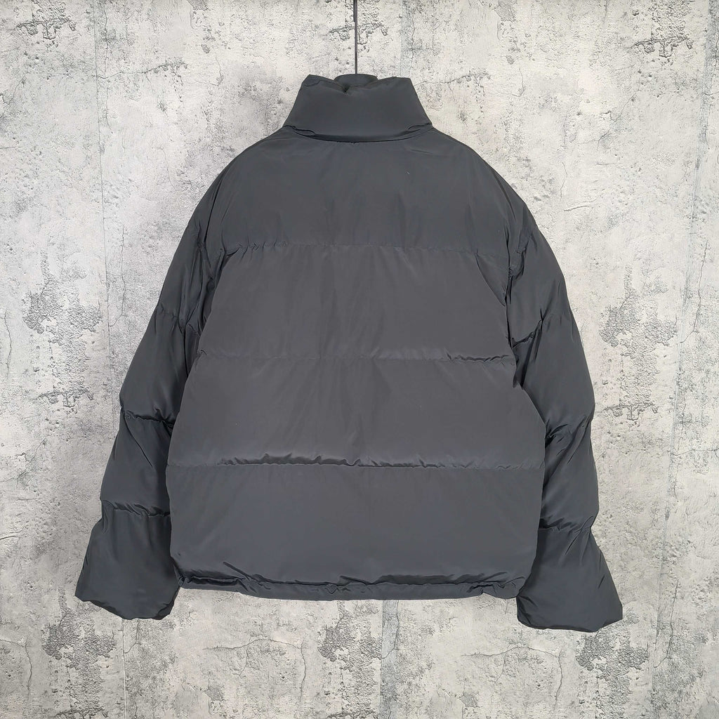 Long hooded puffer jacket, dark gray, with high neck and buttoned front