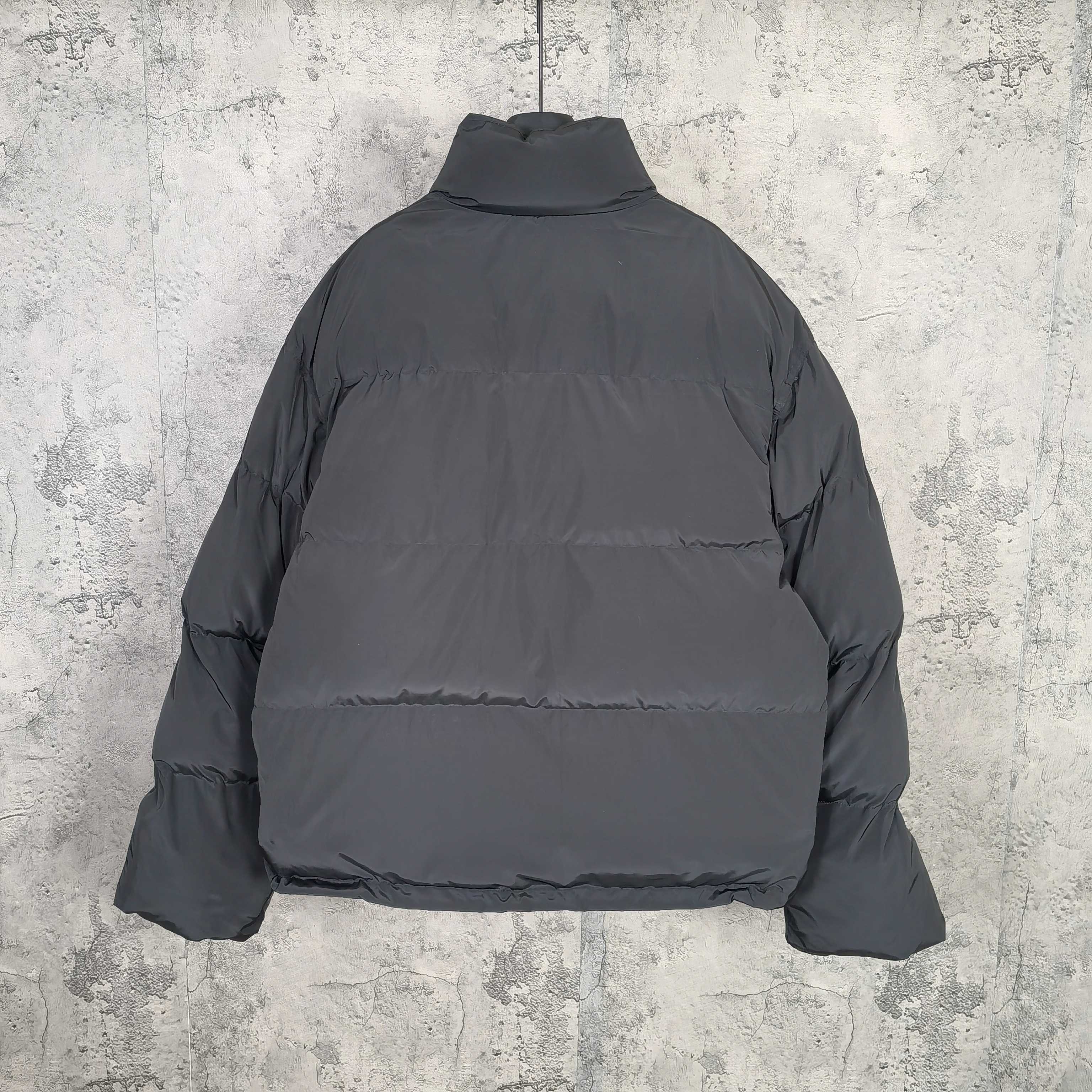 Long hooded puffer jacket, dark gray, with high neck and buttoned front