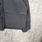 Balenciaga long puffer coat, dark gray with flap pocket and snap buttons