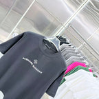 Dark T-shirt with crew neck and chest logo-style graphic print detail