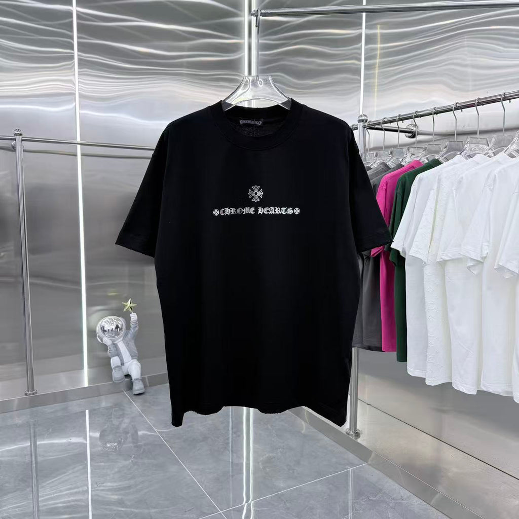 Black crew-neck short-sleeve T-shirt with small chest graphic print