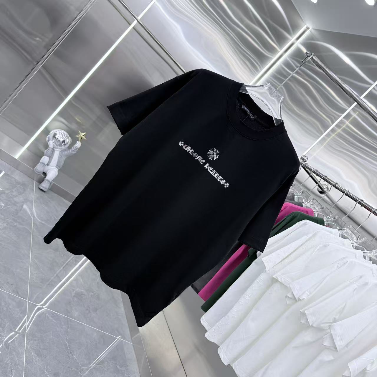 Black short-sleeve T-shirt with chest logo-style graphic print