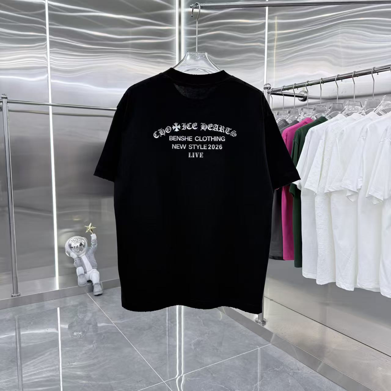Black crew-neck short-sleeve T-shirt with chest graphic print