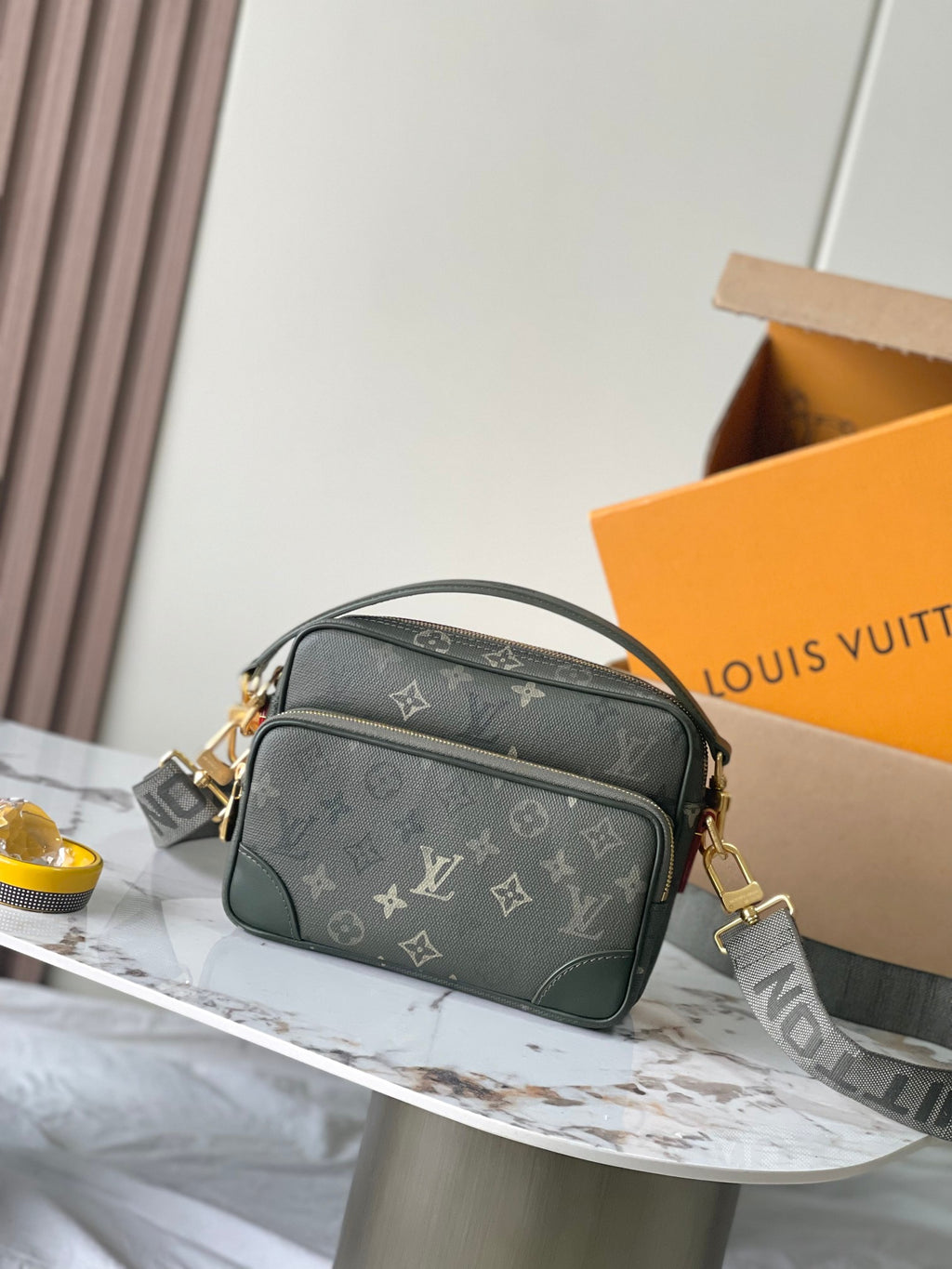 Louis Vuitton crossbody bag in dark green monogram canvas with gold-tone hardware