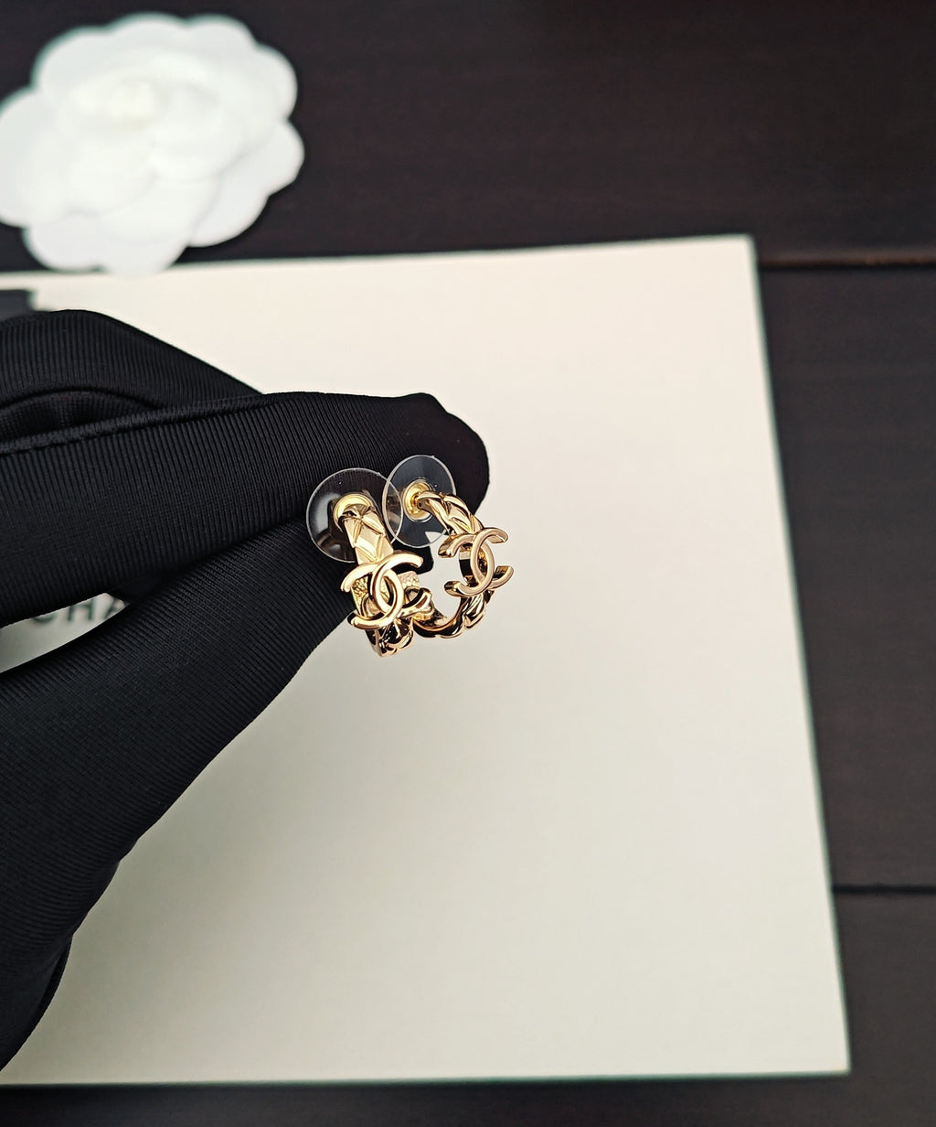 Gold-tone Chanel CC statement ring with interlocking logo detail