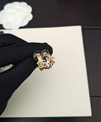 Gold-tone Chanel CC statement ring with interlocking logo detail