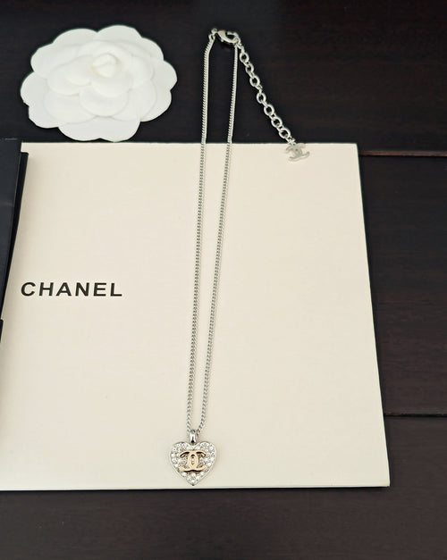Silver-tone double chain necklace with heart pendant