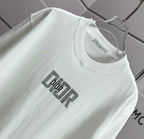 Dior white short-sleeve T-shirt with crew neck and front logo graphic close-up