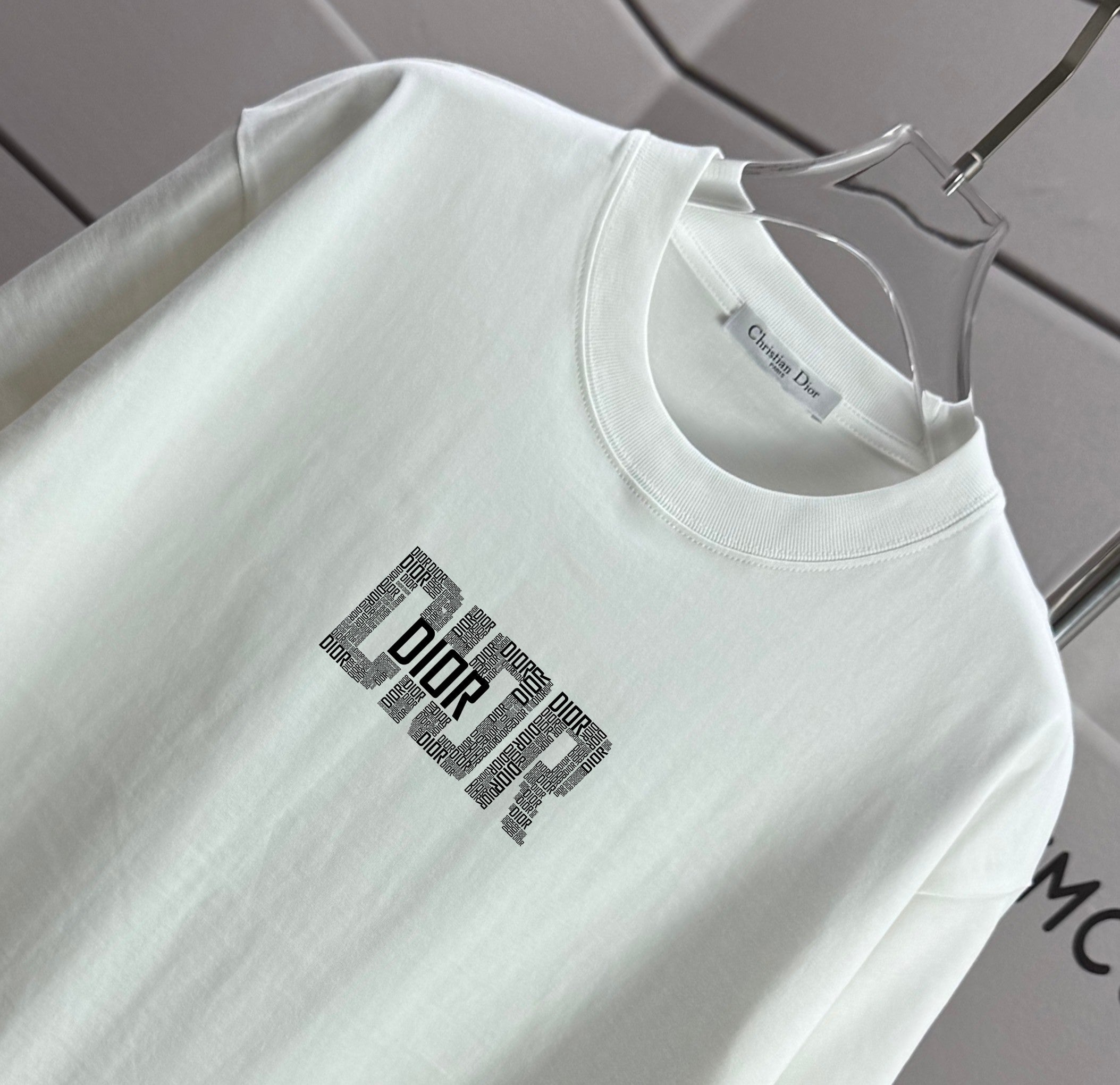 Dior white short-sleeve T-shirt with crew neck and front logo graphic close-up