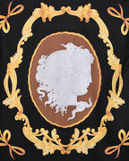 Black shirt with white profile cameo medallion and ornate gold frame and scrollwork