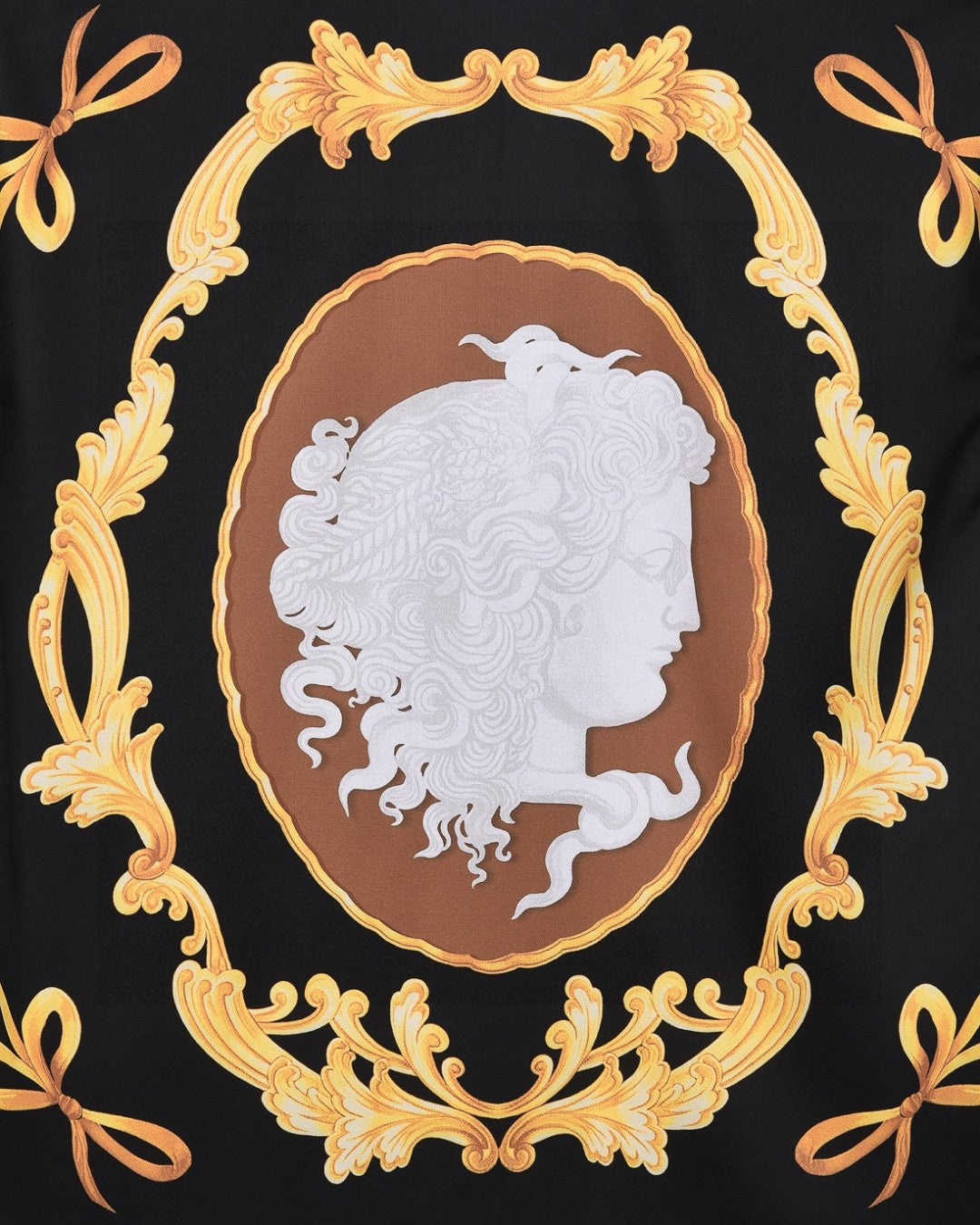 Black shirt with white profile cameo medallion and ornate gold frame and scrollwork