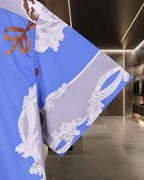 Versace short-sleeve button-up shirt hem, blue/white contrast with baroque motifs