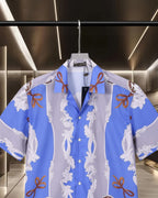 Versace short-sleeve button-up shirt with pointed collar, blue/white baroque print