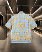 Versace short-sleeve button-up shirt, back view, light blue with gold chain and crest
