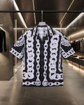 Versace black short-sleeve shirt with white chain link pattern, button front
