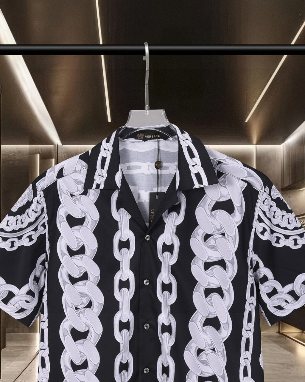 Versace black short-sleeve shirt with white chain print, collared neckline and buttons