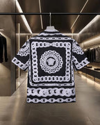 Versace black short-sleeve shirt with rear medallion and white chain print, button front